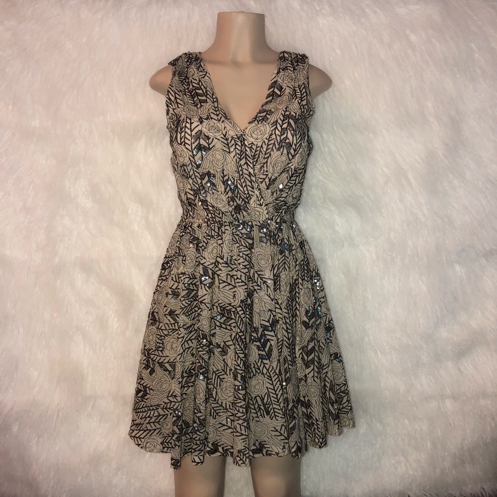 Sequined fit and flare by Erin Featherton